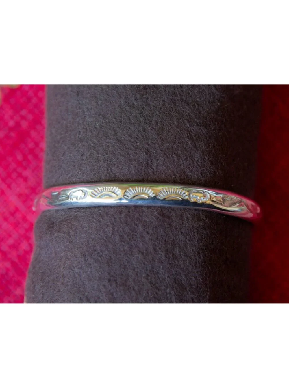 Vintage Navajo Sterling Silver Cuff Bracelet with stamped sun and bison designs